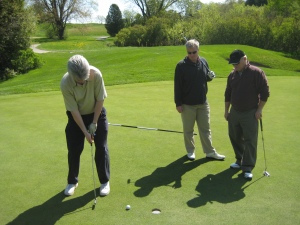 From left to right: Gary, Bill, Marc.  Incidentally, Gary made the putt... or at least that's how I'll tell the story :P
